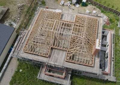 an aerial view of an extensive roof showing timber roof trusses, designed and supplied by ETE Ltd
